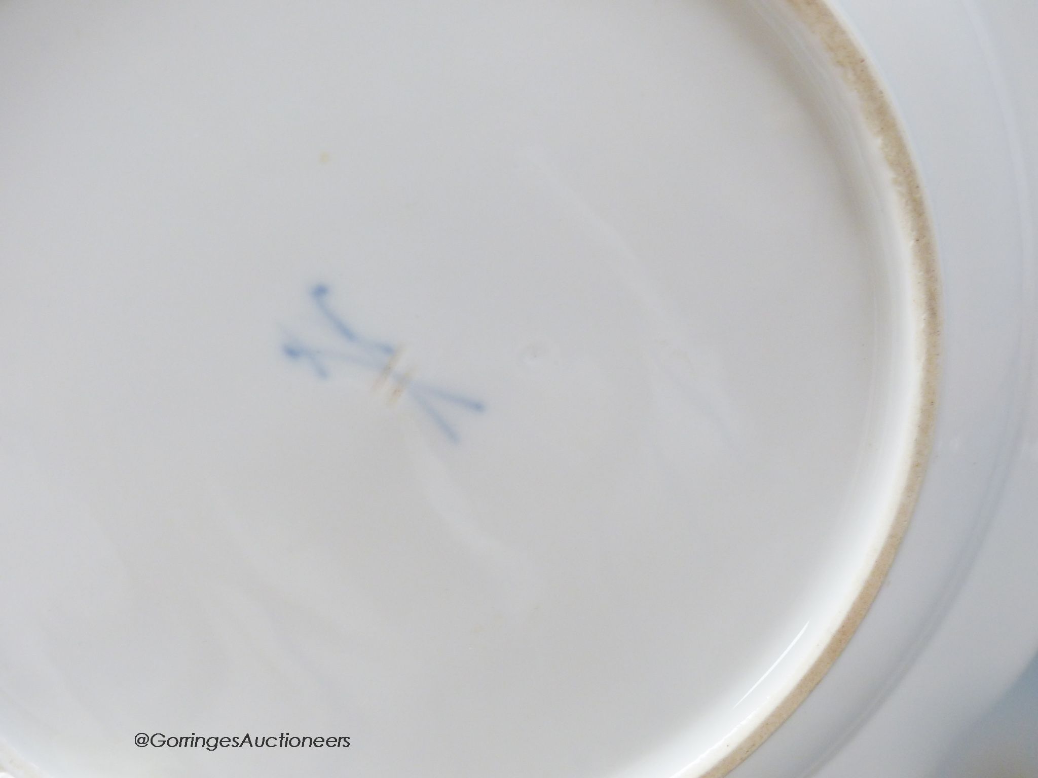 A set of six Meissen dessert dishes, painted with birds,factory seconds, 25.5cm diameter